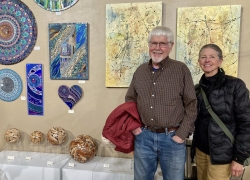 <p>It was so good to see our artist friends, Roger Asay and Rebecca Davis pictured next to their amazing wooden spheres!</p>